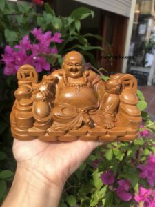 Phật Di Lặc Cầm Thỏi Vàng