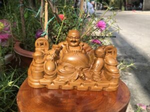 Phật Di Lặc Cầm Thỏi Vàng